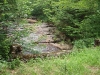 View of stream from old bridge